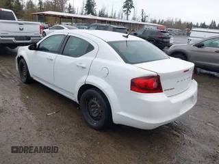 2013 Dodge Avenger SE with VIN 1C3CDZAB1DN646005, listed as a IAAI auction lot 40856048 with 143,386 mi miles and . Bid and sale history available at carsss.com. Image 3.