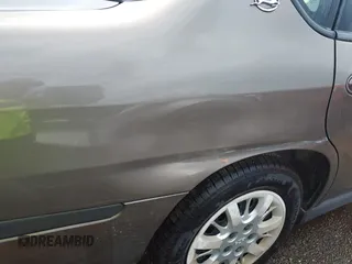 2002 Chevrolet Impala z VIN 2G1WF52E129296761, wystawiony jako IAAI lot #41743889 z przebiegiem 140 282 mil mil oraz . Historia ofert i sprzedaży dostępna na DreamBid. Obrazek 12.
