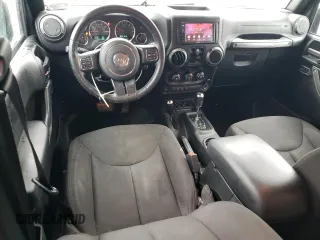 2016 Jeep Wrangler Unlimited Sport with VIN 1C4BJWDG2GL305086, listed as a Copart auction lot 48212105 with 113,001 mi miles and Salvage Title. Bid and sale history available at DreamBid. Image 8.