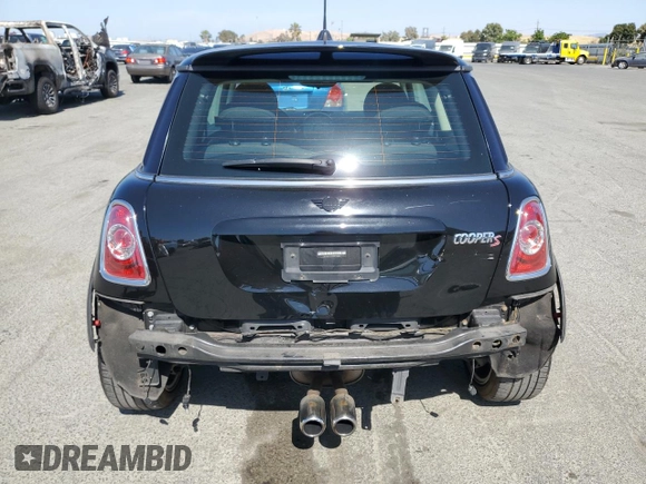 2011 MINI Hardtop S with VIN WMWSV3C57BTY16043, listed as a Copart auction lot 59337575 with 84,617 mi miles and Salvage title. Bid and sale history available at DreamBid. Image 6.