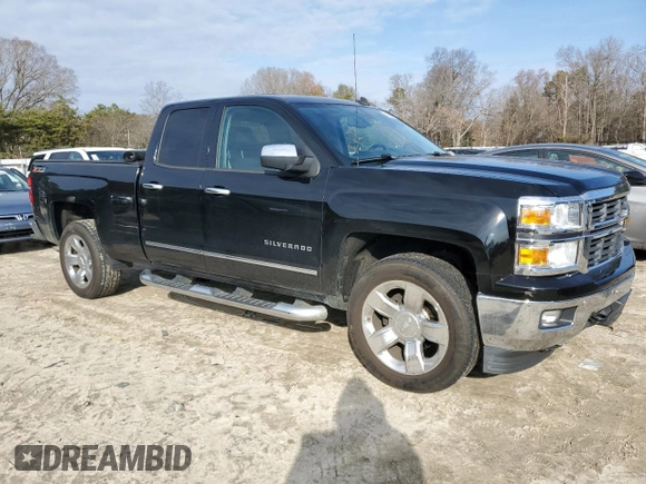 2014 Chevrolet Silverado 1500 LTZ with VIN 1GCVKSEC3EZ269921, listed as a Copart auction lot 84896084 with 136,671 mi miles and Salvage Title. Bid and sale history available at DreamBid. Image 4.