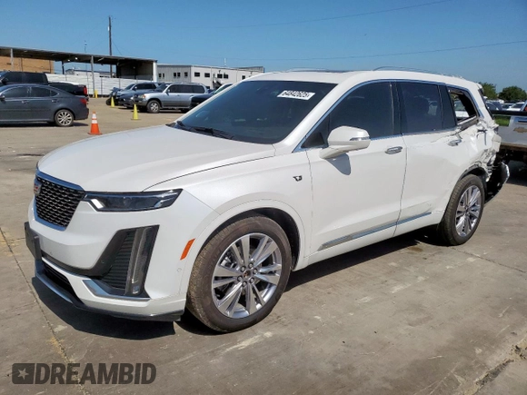 2024 Cadillac XT6 FWD Premium Luxury with VIN 1GYKPCRS7RZ711983, listed as a Copart auction lot 64842625 with 6,394 mi miles and Clean title. Bid and sale history available at DreamBid. Image 1.