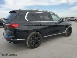 2022 BMW X7 xDrive40i with VIN 5UXCW2C05N9N00658, listed as a Copart auction lot 52007945 with 23,690 mi miles and Salvage Title. Bid and sale history available at carsss.com. Image 3.