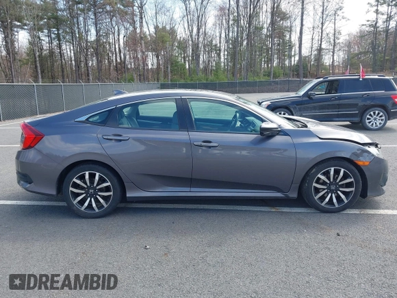 2016 Honda Civic Sedan EX-L with VIN 19XFC1F73GE201419, listed as a IAAI auction lot 42027720 with 168,134 mi miles. Bid and sale history available at carsss.com. Image 13.