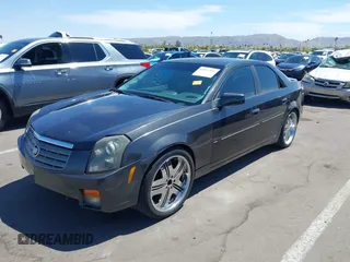 2005 Cadillac CTS with VIN 1G6DP567650227203, listed as a IAAI auction lot 42011203 with 151,683 mi miles. Bid and sale history available at carsss.com. Image 2.