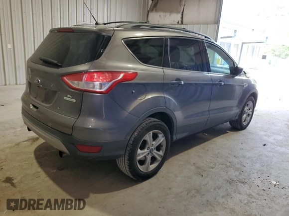 2013 Ford Escape SE with VIN 1FMCU0GX7DUC84970, listed as a Copart auction lot 59611935 with 138,605 mi miles and Salvage title. Bid and sale history available at DreamBid. Image 3.