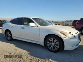 2011 Infiniti M with VIN JN1BY1AR6BM376544, listed as a Copart auction lot 68720604 with 151,191 mi miles and Salvage Title. Bid and sale history available at DreamBid. Image 4.