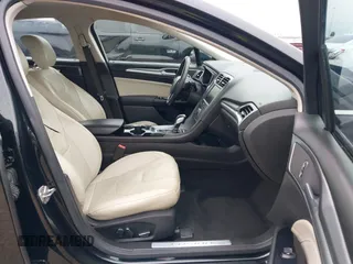 2014 Ford Fusion Titanium with VIN 3FA6P0K9XER364392, listed as a IAAI auction lot 41642439 with 130,302 mi miles and . Bid and sale history available at DreamBid. Image 5.