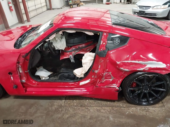 2014 Nissan 370Z with VIN JN1AZ4EHXEM633723, listed as a IAAI auction lot 41588284 with 1 mi miles. Bid and sale history available at carsss.com. Image 17.