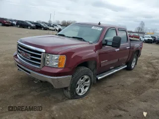 2013 GMC Sierra 1500 SLE z VIN 3GTP2VE73DG220231, wystawiony jako Copart lot #49064045 z przebiegiem 118 498 mil mil oraz Czysty tytuł • Clean title. Historia ofert i sprzedaży dostępna na DreamBid. Obrazek 1.
