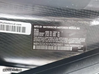 2015 BMW i8 with VIN WBY2Z2C51FV392661, listed as a IAAI auction lot 38409147 with 79,082 mi miles. Bid and sale history available at carsss.com. Image 9.