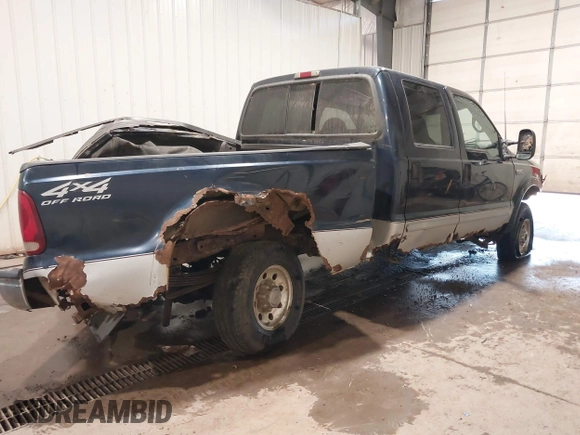 2001 Ford Super Duty F-250 XL with VIN 1FTNW21FX1EC34184, listed as a IAAI auction lot 40381913 with 230,400 mi miles. Bid and sale history available at carsss.com. Image 4.