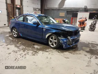 2010 BMW 1 Series 128i with VIN WBAUP9C57AVF49515, listed as a IAAI auction lot 41154745 with 120,982 mi miles and . Bid and sale history available at carsss.com. Image 1.