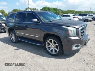 2016 GMC Yukon SLT with VIN 1GKS2BKC2GR277460, listed as a IAAI auction lot 42027026 with 111,191 mi miles. Bid and sale history available at carsss.com. Image 1.