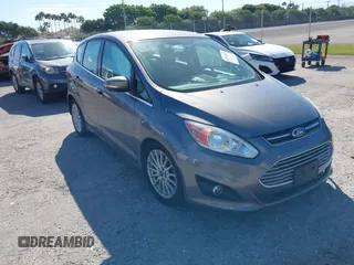 2013 Ford C-Max SEL z VIN 1FADP5CU7DL512258, wystawiony jako IAAI lot #41719968 z przebiegiem 136 601 mil mil oraz . Historia ofert i sprzedaży dostępna na DreamBid. Obrazek 1.