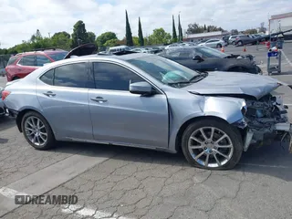 2015 Acura TLX Technology z VIN 19UUB2F52FA006669, wystawiony jako IAAI lot #42421269 z przebiegiem 89 057 mil mil oraz . Historia ofert i sprzedaży dostępna na DreamBid. Obrazek 13.