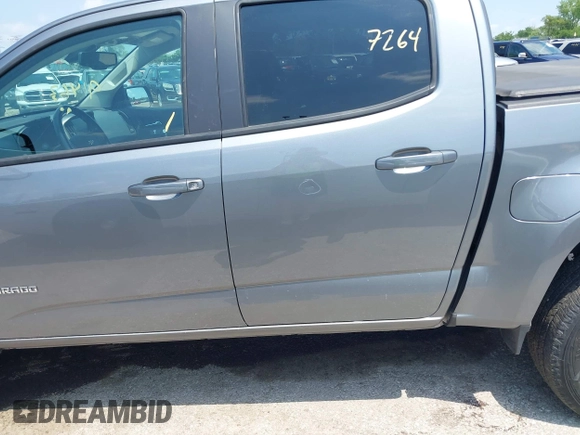 2018 Chevrolet Colorado 4WD Z71 with VIN 1GCGTDENXJ1247717, listed as a IAAI auction lot 42557264 with 91,463 mi miles and . Bid and sale history available at DreamBid. Image 14.