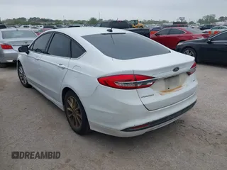 2017 Ford Fusion SE with VIN 3FA6P0H79HR149533, listed as a IAAI auction lot 41886152 with 119,049 mi miles. Bid and sale history available at carsss.com. Image 3.