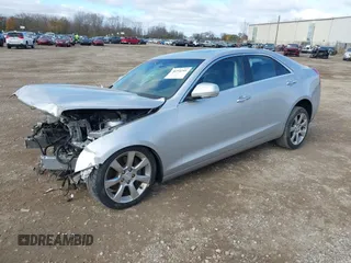 2015 Cadillac ATS Luxury RWD z VIN 1G6AB5RXXF0123831, wystawiony jako IAAI lot #40754245 z przebiegiem Nie podano mil oraz . Historia ofert i sprzedaży dostępna na DreamBid. Obrazek 17.