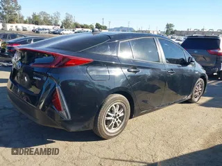 2022 Toyota Prius LE with VIN JTDKAMFP5N3225781, listed as a IAAI auction lot 40822065 with 42,307 mi miles and . Bid and sale history available at DreamBid. Image 4.
