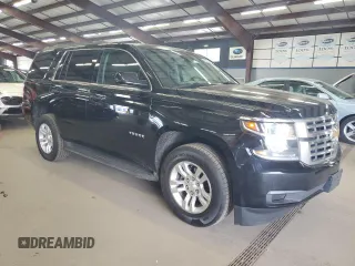 2015 Chevrolet Tahoe LS with VIN 1GNSCAKC9FR301715, listed as a Copart auction lot 64249005 with 107,240 mi miles and Clean title. Bid and sale history available at DreamBid. Image 4.