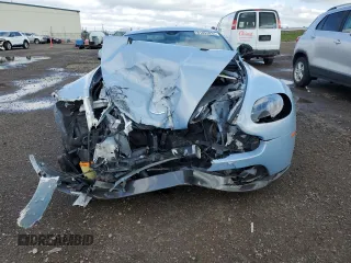 2015 Aston Martin Vantage z VIN SCFEKBAK2FGC19462, wystawiony jako Copart lot #61093934 z przebiegiem 53 068 mil mil oraz Szkoda całkowita • Salvage title. Historia ofert i sprzedaży dostępna na DreamBid. Obrazek 5.