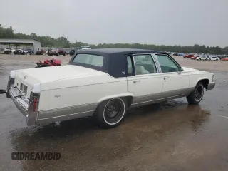 1992 Cadillac Brougham with VIN 1G6DW54E5NR708009, listed as a Copart auction lot 56849345 with 83,203 mi miles and Salvage title. Bid and sale history available at DreamBid. Image 3.