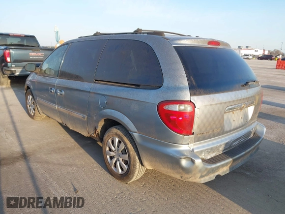 2005 Chrysler Town & Country Touring with VIN 2C4GP54L95R408571, listed as a IAAI auction lot 41792261 with 187,759 mi miles. Bid and sale history available at carsss.com. Image 3.