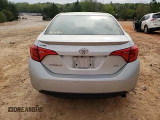 2019 Toyota Corolla L with VIN 5YFBURHE5KP910088, listed as a Copart auction lot 52401885 with 130,124 mi miles and Salvage Title. Bid and sale history available at DreamBid. Image 6.