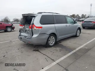 2011 Toyota Sienna XLE AAS with VIN 5TDYK3DC5BS150527, listed as a IAAI auction lot 41143189 with 147,551 mi miles and . Bid and sale history available at DreamBid. Image 4.