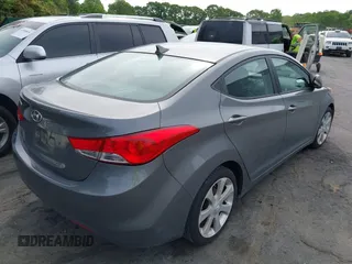 2013 Hyundai Elantra Limited z VIN 5NPDH4AEXDH384227, wystawiony jako IAAI lot #42106321 z przebiegiem 145 862 mil mil oraz . Historia ofert i sprzedaży dostępna na DreamBid. Obrazek 4.