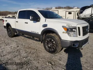 2017 Nissan Titan Pro-4X z VIN 1N6BA1F42HN571085, wystawiony jako Copart lot #49859795 z przebiegiem 163 835 mil mil oraz Tytuł czysty. Historia ofert i sprzedaży dostępna na DreamBid. Obrazek 4.