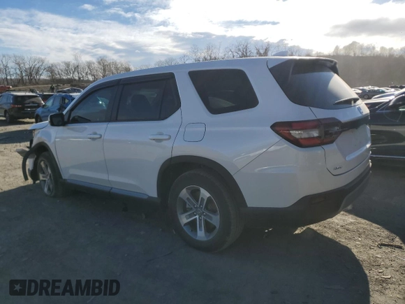 2024 Honda Pilot EX-L 7 Passenger with VIN 5FNYG1H52RB049090, listed as a Copart auction lot 41562695 with 9,939 mi miles and Salvage Title. Bid and sale history available at carsss.com. Image 2.