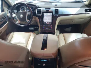 2009 Cadillac Escalade z VIN 1GYFK43569R209961, wystawiony jako Copart lot #54011705 z przebiegiem 143 894 mil mil oraz Czysty tytuł • Clean title. Historia ofert i sprzedaży dostępna na DreamBid. Obrazek 8.