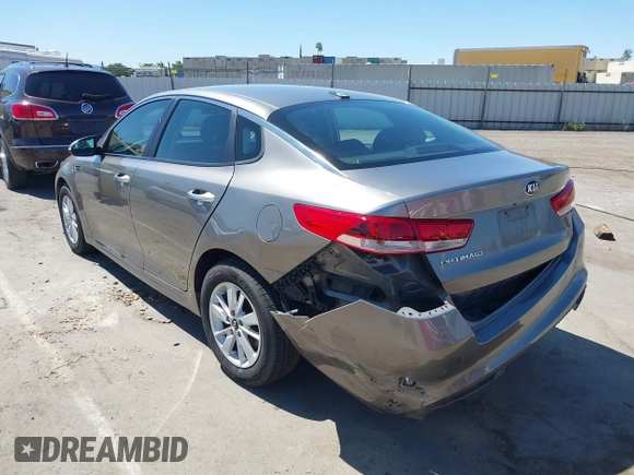 2016 Kia Optima LX with VIN 5XXGT4L36GG098804, listed as a IAAI auction lot 42772231 with 206,471 mi miles and . Bid and sale history available at DreamBid. Image 3.