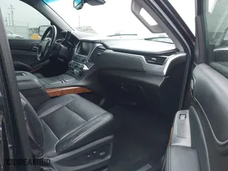 2017 Chevrolet Suburban Premier with VIN 1GNSKJKC4HR162261, listed as a IAAI auction lot 41593672 with 100,136 mi miles. Bid and sale history available at carsss.com. Image 5.