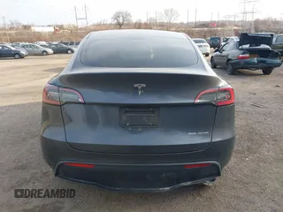 2023 Tesla Model Y Long Range with VIN 7SAYGAEEXPF612231, listed as a IAAI auction lot 41758243 with 32,924 mi miles and . Bid and sale history available at DreamBid. Image 17.