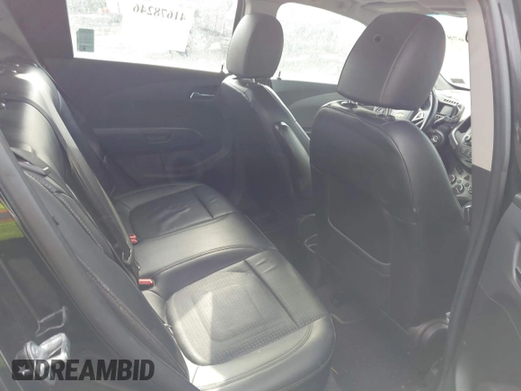 2012 Chevrolet Sonic LTZ z VIN 1G1JE6SH2C4114048, wystawiony jako IAAI lot #41678246 z przebiegiem 138 863 mil mil oraz . Historia ofert i sprzedaży dostępna na DreamBid. Obrazek 8.
