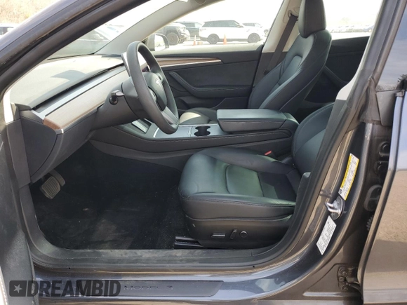 2023 Tesla Model 3 with VIN 5YJ3E1EA8PF699931, listed as a Copart auction lot 49293795 with 13,119 mi miles and Salvage Title. Bid and sale history available at DreamBid. Image 7.