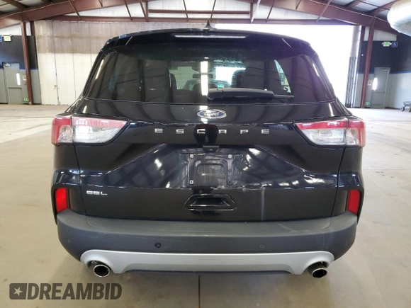 2021 Ford Escape SEL with VIN 1FMCU9H64MUA50988, listed as a Copart auction lot 54517685 with 122,593 mi miles and Salvage Title. Bid and sale history available at DreamBid. Image 6.