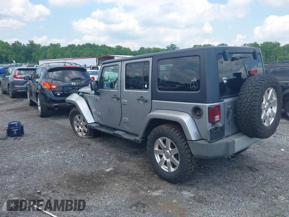 2014 Jeep Wrangler Unlimited Sahara z VIN 1C4BJWEG0EL129229, wystawiony jako IAAI lot #42380976 z przebiegiem 175 735 mil mil oraz . Historia ofert i sprzedaży dostępna na DreamBid. Obrazek 3.