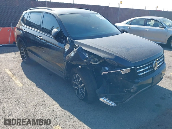 2021 Volkswagen Tiguan S with VIN 3VV1B7AX2MM142289, listed as a IAAI auction lot 42403346 with 71,182 mi miles and . Bid and sale history available at DreamBid. Image 1.