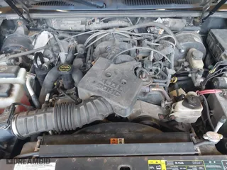 2005 Ford Explorer Sport Trac XLS with VIN 1FMZU77K45UB32573, listed as a IAAI auction lot 41760637 with 216,186 mi miles. Bid and sale history available at carsss.com. Image 10.