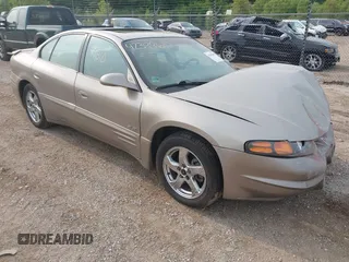 2002 Pontiac Bonneville SLE z VIN 1G2HY54K224168419, wystawiony jako IAAI lot #42399610 z przebiegiem 150 448 mil mil oraz . Historia ofert i sprzedaży dostępna na DreamBid. Obrazek 1.