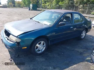 1997 Nissan Altima XE z VIN 1N4BU31D1VC199720, wystawiony jako IAAI lot #42061192 z przebiegiem 312 370 mil mil oraz . Historia ofert i sprzedaży dostępna na DreamBid. Obrazek 2.