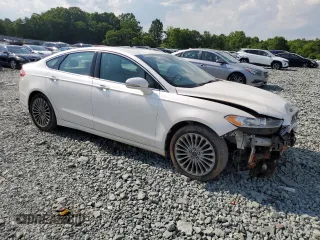 2016 Ford Fusion Titanium with VIN 3FA6P0D90GR286625, listed as a Copart auction lot 57216665 with 173,100 mi miles and Salvage title. Bid and sale history available at DreamBid. Image 4.