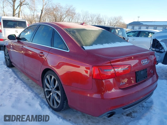 2013 Audi A6 3.0T Prestige with VIN WAUJGAFC5DN030463, listed as a IAAI auction lot 41304345 with 134,216 mi miles. Bid and sale history available at carsss.com. Image 3.