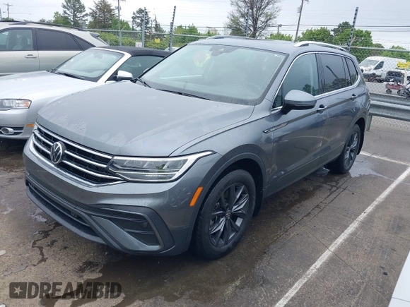 2022 Volkswagen Tiguan SE with VIN 3VV3B7AX7NM008114, listed as a IAAI auction lot 41843315 with 42,016 mi miles and . Bid and sale history available at DreamBid. Image 2.