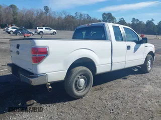 2014 Ford F-150 XL with VIN 1FTFX1CF5EKG23962, listed as a IAAI auction lot 41453430 with 184,837 mi miles. Bid and sale history available at carsss.com. Image 4.