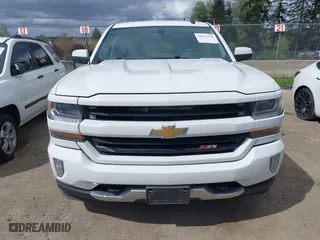 2017 Chevrolet Silverado 1500 LT with VIN 1GCVKREC7HZ131196, listed as a IAAI auction lot 42072336 with 158,140 mi miles. Bid and sale history available at carsss.com. Image 12.